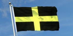 St David's flag with a yellow cross on a black background.