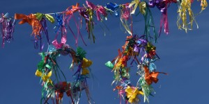 May Day traditions often include flowers, ribbons and crowns.
